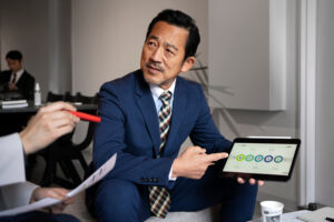 A Businessman Presenting A Visual Presentation